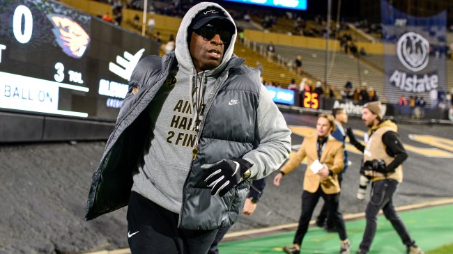 Deion Sanders on the field before a game against Oregon State.