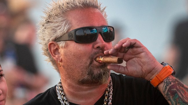 Guy Fieri smoking a cigar