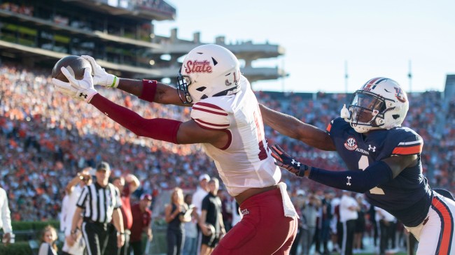 A New Mexico State receiver hauls in a touchdown pass against Auburn.