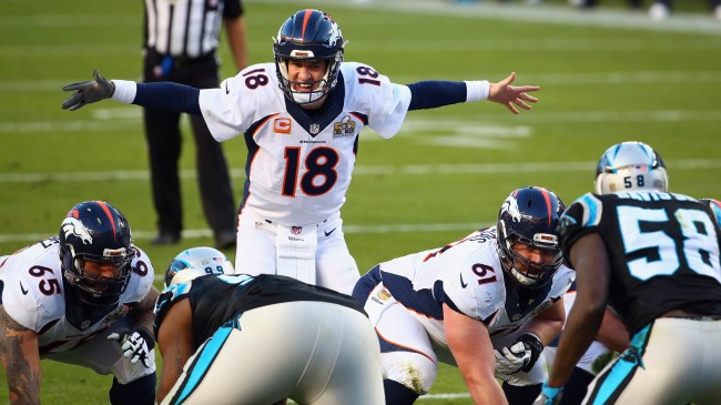 Peyton Manning calls a play at the line of scrimmage.