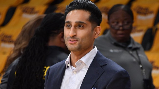 Shams Charania attends a Lakers basketball game.
