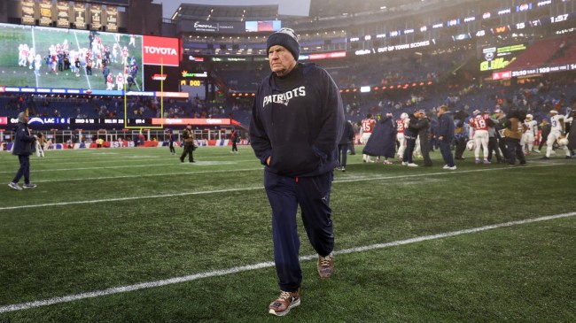 Bill Belichick walks off the field after the Patriots' loss to the Chargers.
