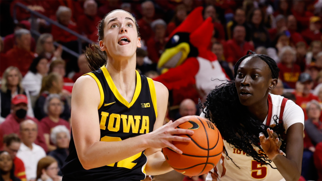 Caitlin Clark of the Iowa Hawkeyes drives against Iowa State Cyclones
