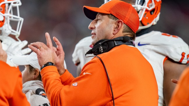 Dabo Swinney coaches his players during a game between Clemson and South Carolina.