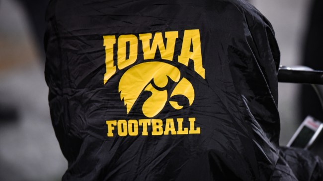 An Iowa football logo on the sidelines.