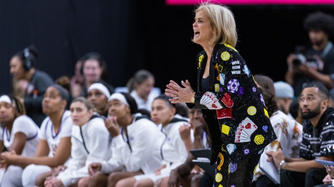 Kim Mulkey coaches her team from the sidelines.