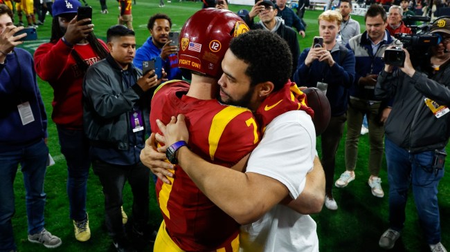 Caleb Williams congratulates Miller Moss after a 6-TD performance in the Holiday Bowl.