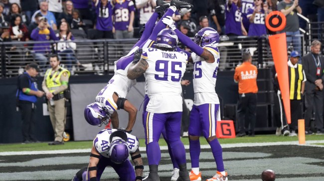 Minnesota Vikings players celebrate a turnover.