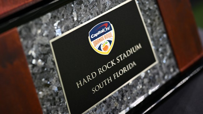 An Orange Bowl logo on a trophy plaque.