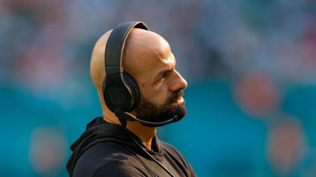 robert saleh wearing a headset