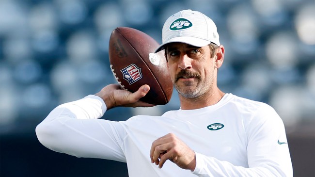 Aaron Rodgers 8 of the New York Jets throws the ball during warmups