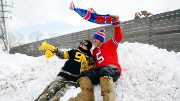 Bills Mafia Out In Full Force, Jumping Off Snow Banks Onto Flaming Tables
