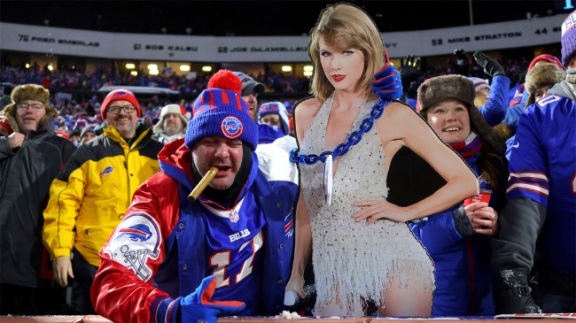 Buffalo Bills fan holds a cardboard cutout of Taylor Swift