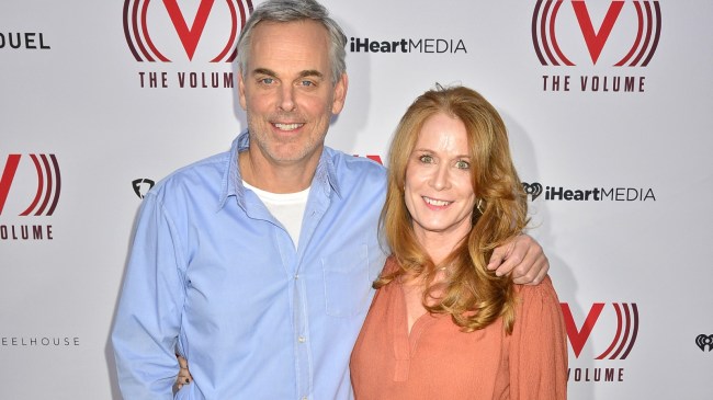 Colin Cowherd of The Volume and his wife, Ann, pose for a photo.