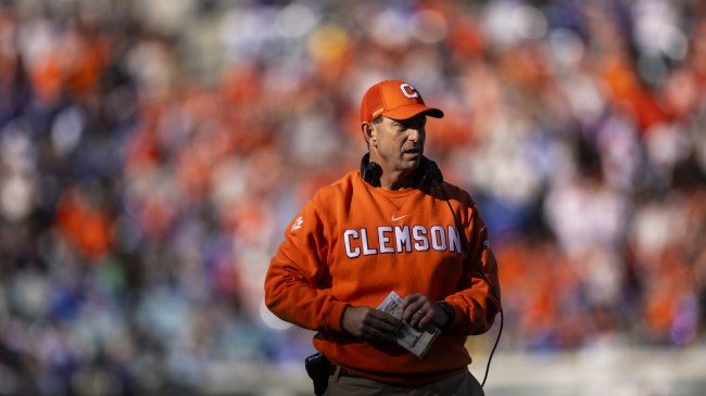 Dabo Swinney walks on the sidelines during a game between Clemson and Kentucky.