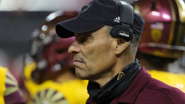Coach Herm Edwards on the sidelines during an Arizona State football game.