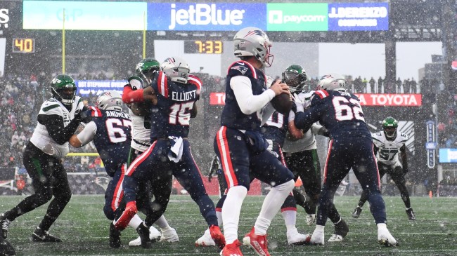 Bailey Zappe drops back to throw a pass during the Patriots vs. Jets game.