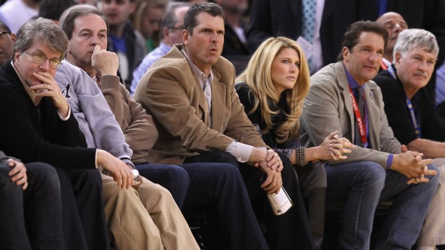 Jim Harbaugh attends an NBA game with wife, Sarah.