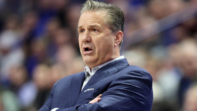 John Calipari reacts on the sidelines during a Kentucky basketball game.