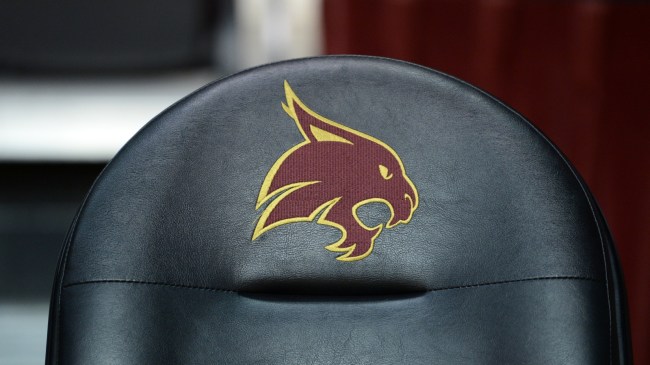 A Texas State logo on a chair at the basektball arena.