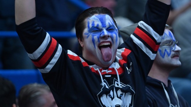 A UCONN fan celebrates during a game between the Huskies and Georgetown.