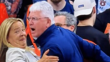 Angry Auburn Fan Held Back By Friends While Sitting Courtside Appears To Serve On NIL Board