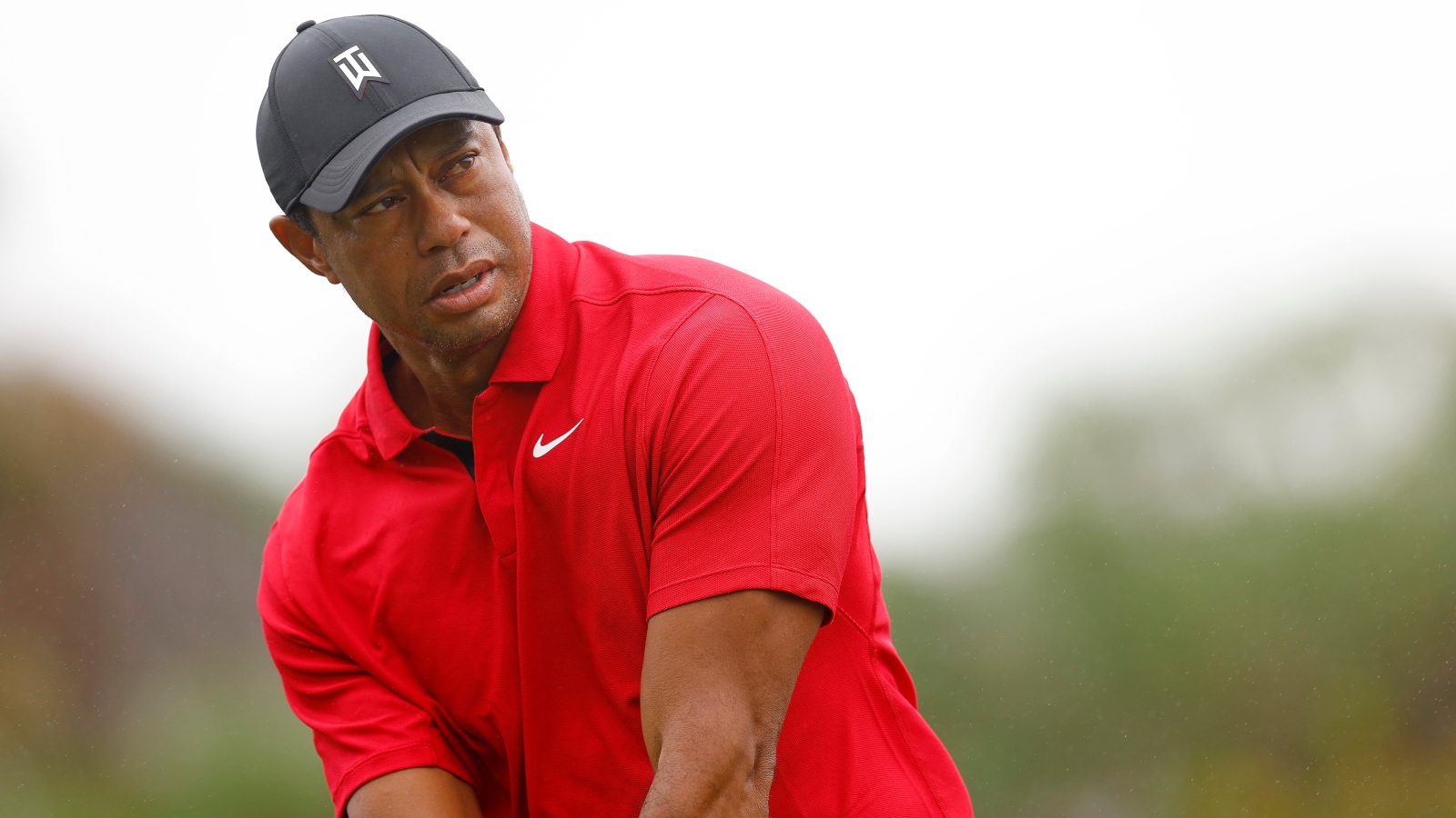 Tiger Woods wearing red and black on Sunday