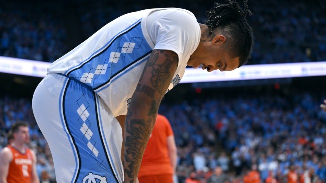 Armando Bacot catches his breath during a game between UNC and Clemson.