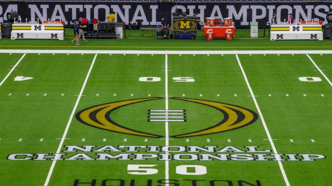 A College Football Playoff logo at midfield before the national championship game.