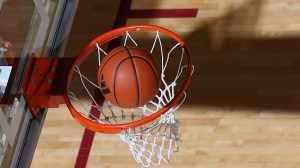 A basketball goes through the net before an Indiana game.