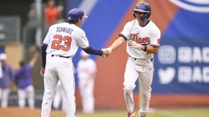 Clemson baseball player Will Taylor rounds the bases after hitting a home run in the ACC Tournament.