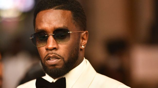 diddy in a white tuxedo
