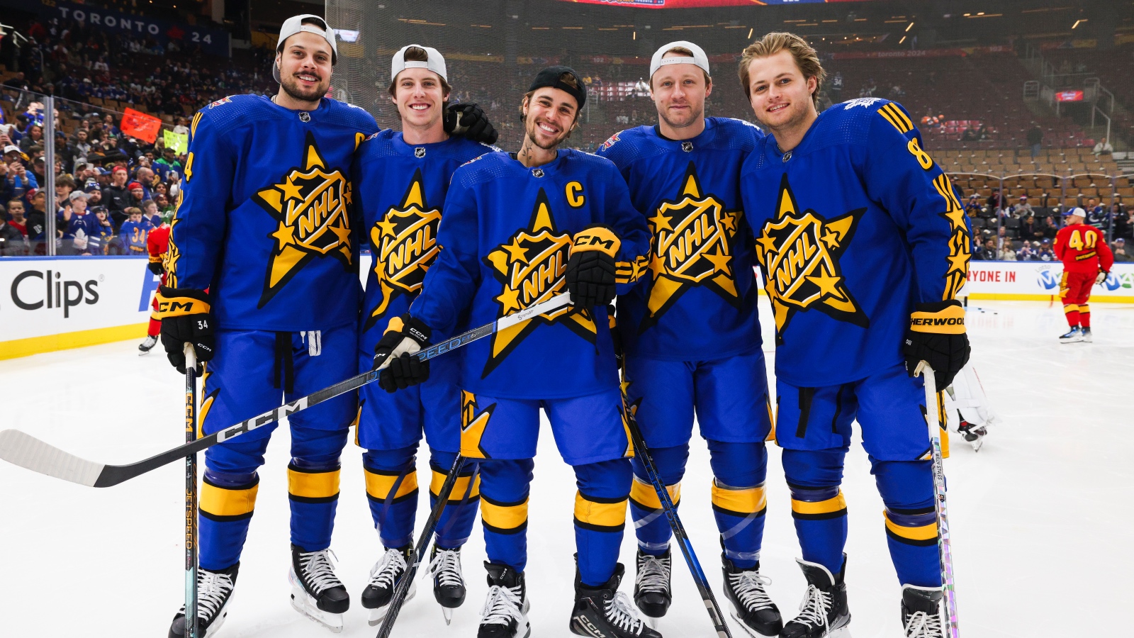 Justin Bieber at the NHL All Star Game playing hockey with the pros