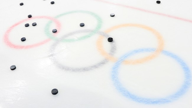 hockey pucks on Olympic rings