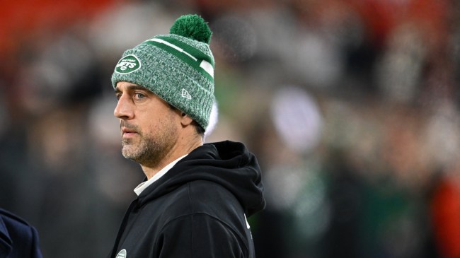 Aaron Rodgers on the sidelines during a New York Jets game.