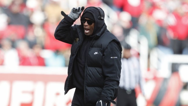 Deion Sanders yells to his Colorado football team from the sidelines.