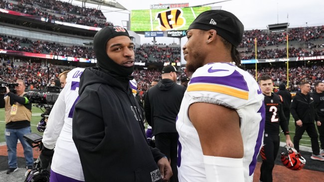 Ja'Marr Chase and Justin Jefferson meet at midfield after a game between the Vikings and Bengals.