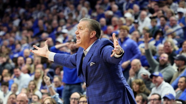 John Calipari coaches his Kentucky team from the bench.