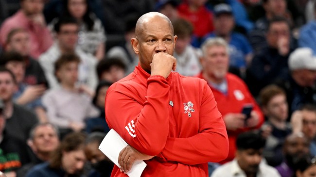 Kenny Payne on the sidelines during a Louisville basketball game.