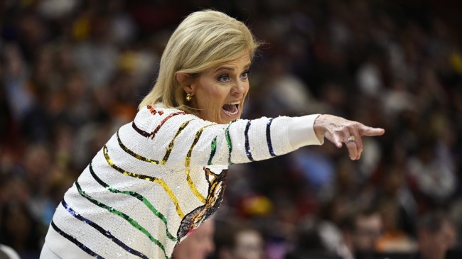 Kim Mulkey directs her LSU team from the bench.