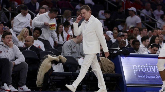 Rick Pitino walks the sideline during a game between St. John's and Creighton.