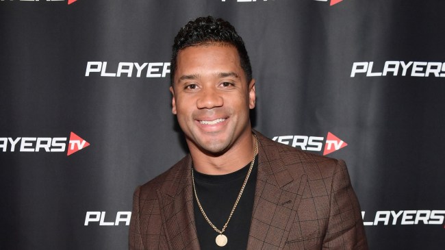 Russell Wilson poses for a photo at a Players TV event.