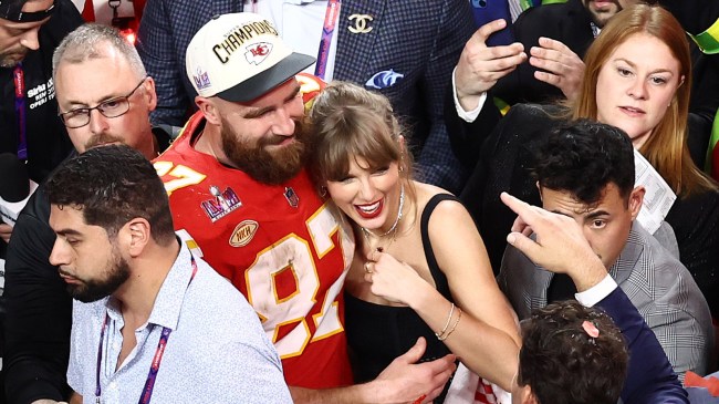 Travis Kelce of the Kansas City Chiefs celebrates with Taylor Swift