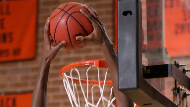 player dunking basketball