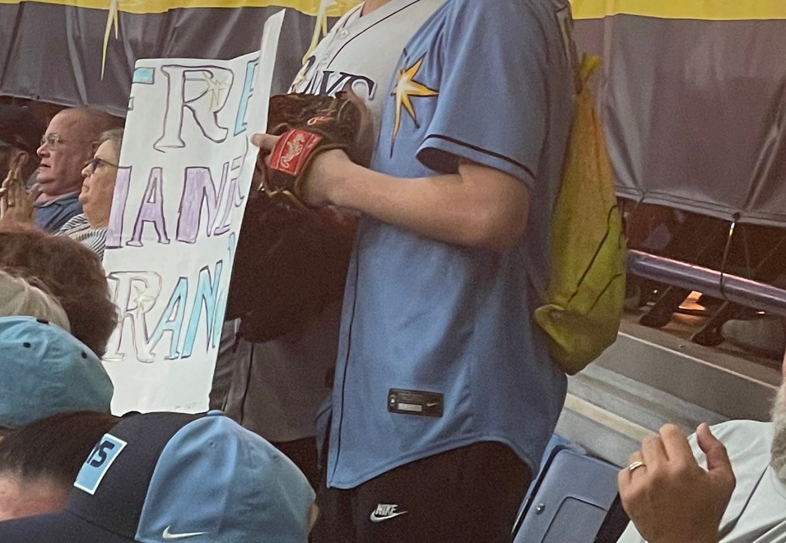 Tampa Bay Rays fans holding free Wander Franco sign