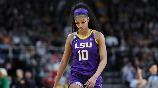 LSU's Angel Reese walks off the court during a game against Iowa.