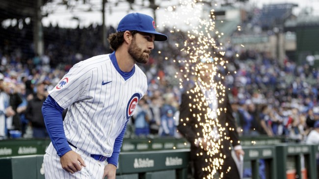 Dansby Swanson runs onto the field for the Chicago Cubs.