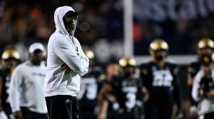 Deion Sanders on the field before a game between Colorado and Colorado State.