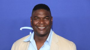 Keyshawn Johnson poses for a photo at an ABC Disney event.