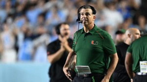 Mario Cristobal on the sidelines during a Miami football game.